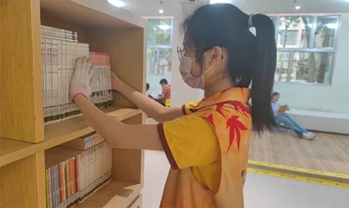 商學(xué)院5月20日開展“共沐書香，閱見美好”志愿活動